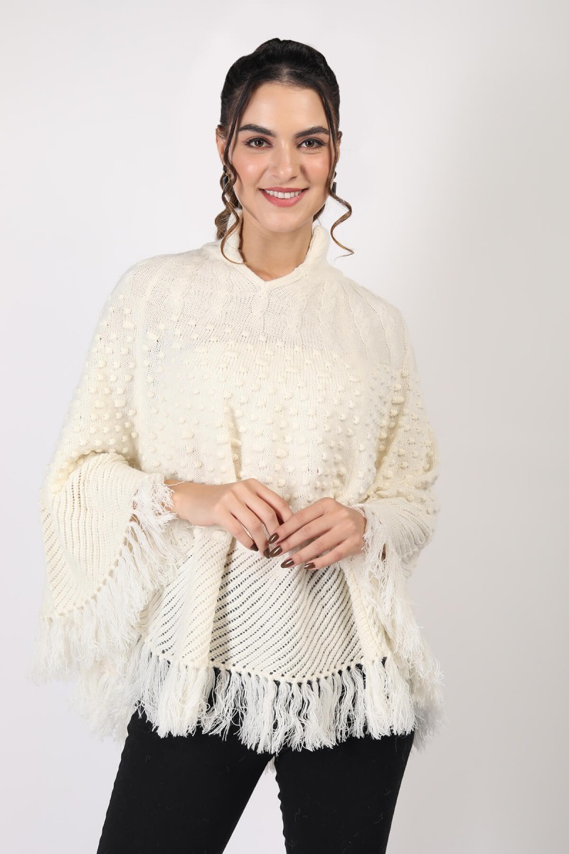 KNITTED PONCHO WITH FRINGES 