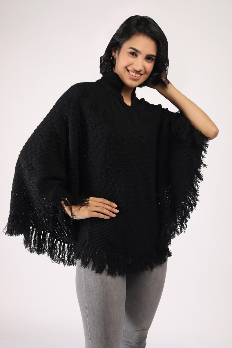 KNITTED PONCHO WITH FRINGES 