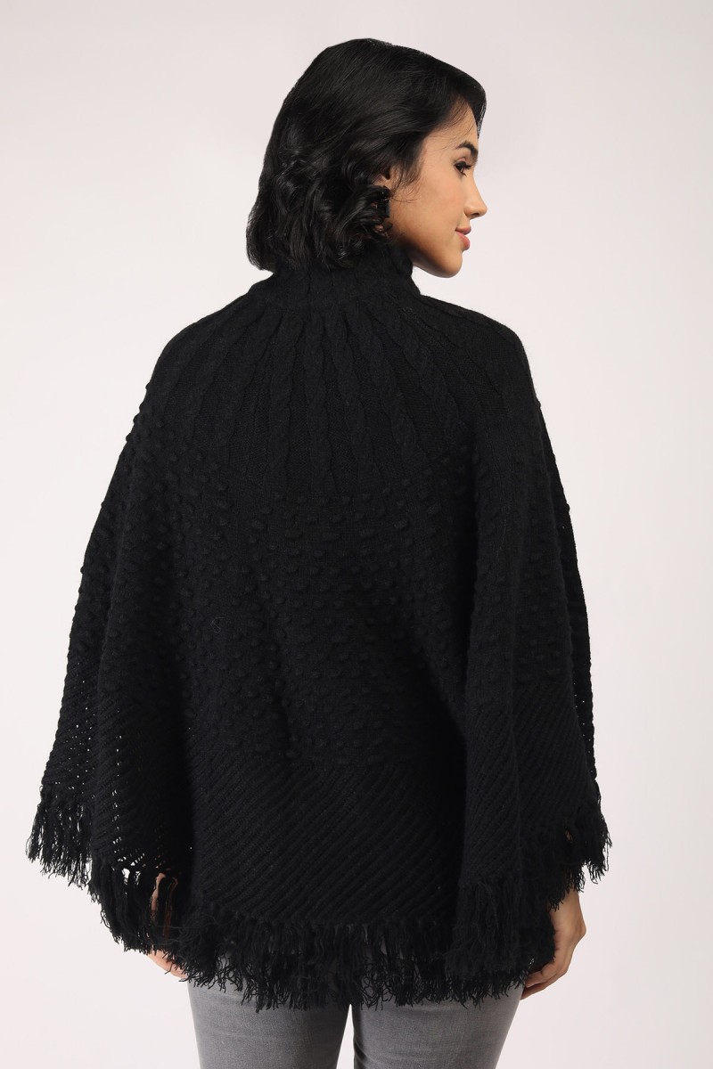 KNITTED PONCHO WITH FRINGES 