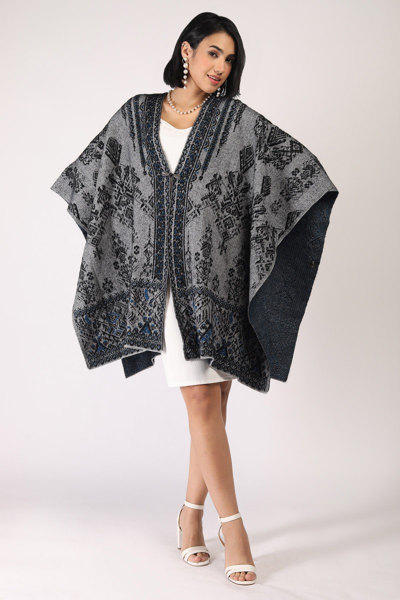 WEAVIING EFFECT JACQUARD KNITTED PONCHO 